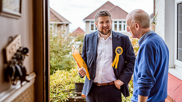 Mike O'Carroll talking to a voter